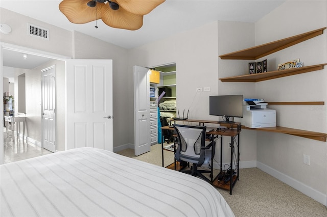 bedroom featuring ceiling fan and light carpet