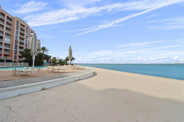 property view of water with a beach view