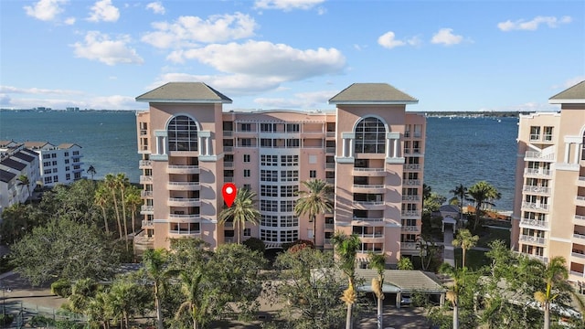 view of property with a water view