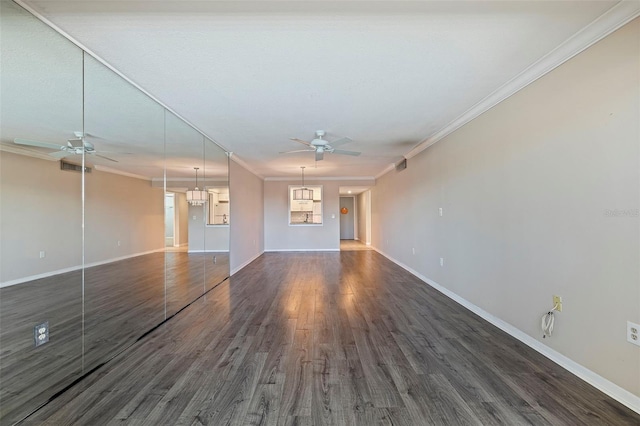 unfurnished living room featuring dark hardwood / wood-style flooring, ceiling fan, and crown molding