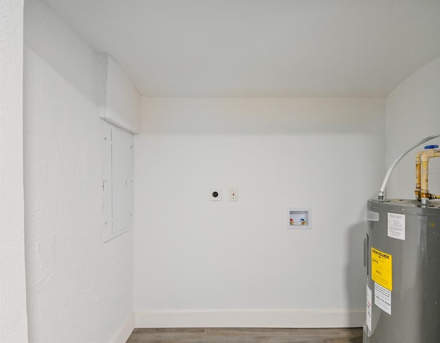 washroom with washer hookup, hardwood / wood-style floors, electric water heater, and electric dryer hookup