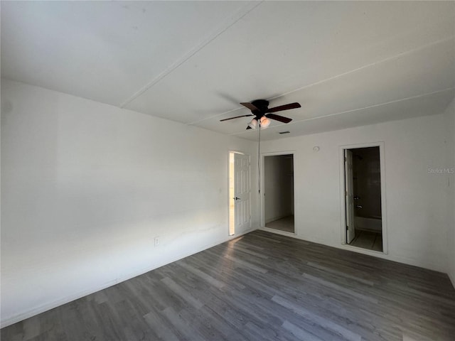 unfurnished room with hardwood / wood-style flooring and ceiling fan