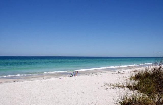 property view of water featuring a beach view