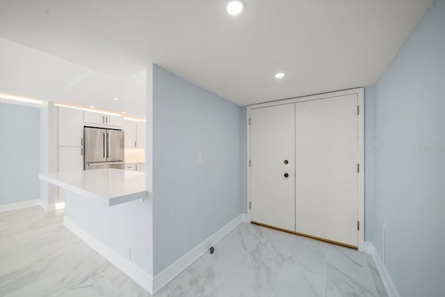 1400 Gulf Blvd Unit 801, Clearwater Beach, FL 33767 - entryway featuring light marble finish flooring, recessed lighting, and baseboards