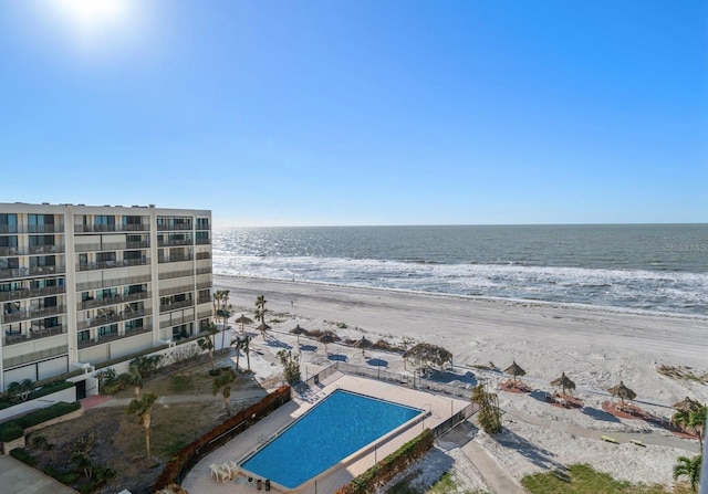 property view of water featuring a beach view