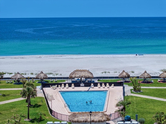 aerial view of extended coastline and a pool area