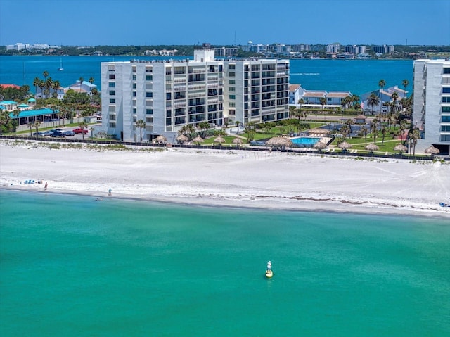 bird's eye view of waterfront with a beach