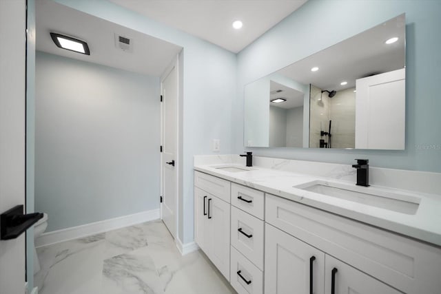 full bathroom featuring marble finish flooring, walk in shower, baseboards, double vanity, and recessed lighting