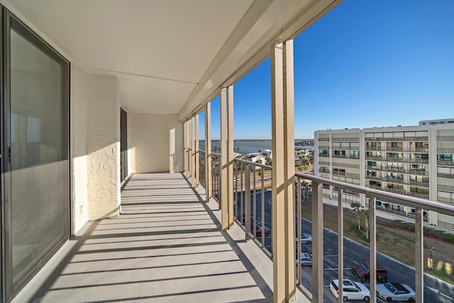 balcony featuring a water view