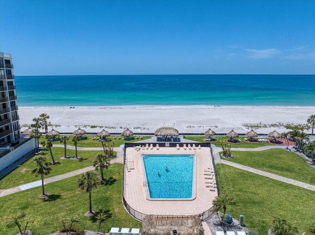 aerial view of expansive coastline and a pool