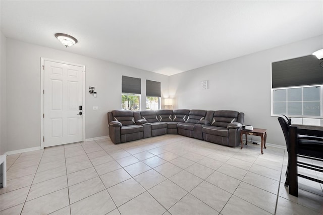 living room featuring light tile patterned flooring