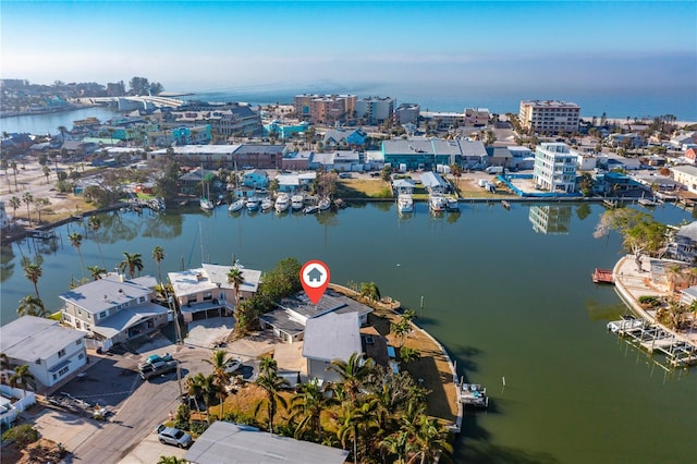 drone / aerial view featuring a water view