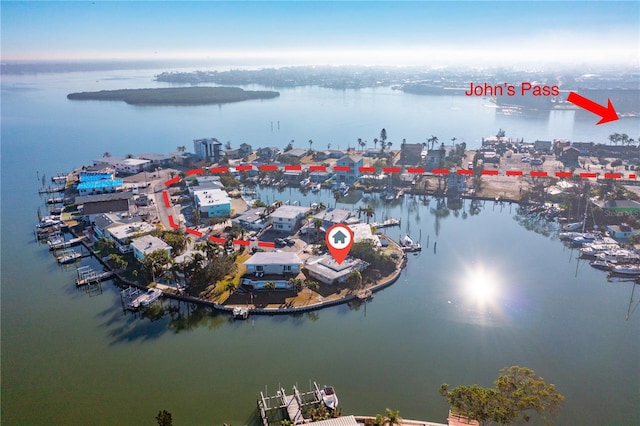 birds eye view of property featuring a water view