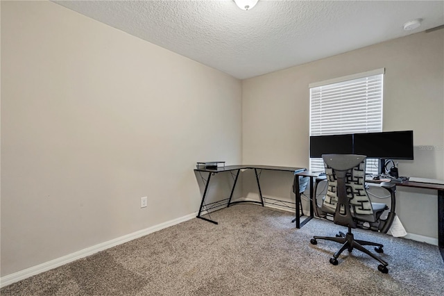 office space featuring a textured ceiling and carpet floors