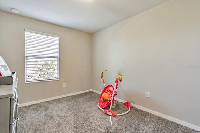 playroom with light colored carpet