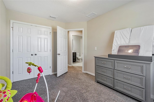 bedroom with dark carpet