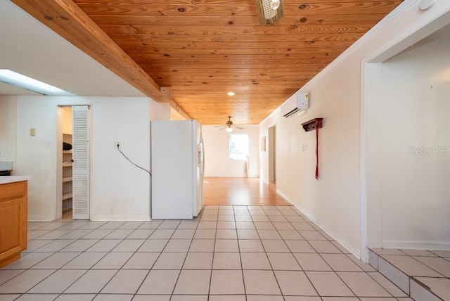 unfurnished room with light tile patterned floors, wooden ceiling, and a wall mounted air conditioner