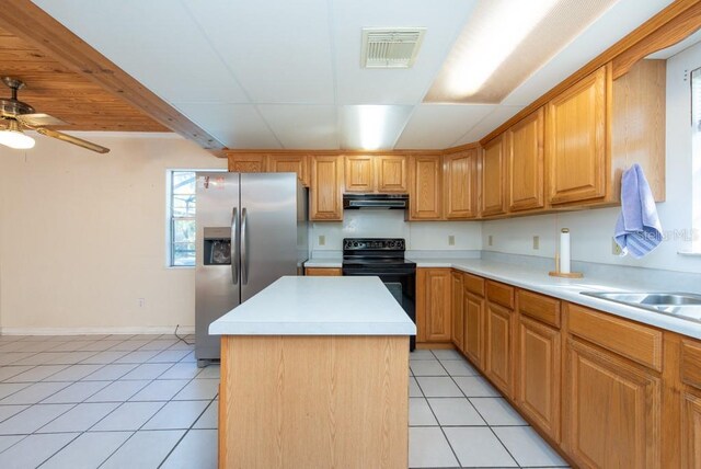11008 Browning Rd, Lithia, FL 33547 - kitchen featuring black electric range, stainless steel fridge with ice dispenser, extractor fan, light tile patterned floors, and a center island