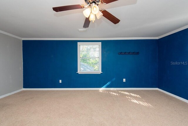 11008 Browning Rd, Lithia, FL 33547 - carpeted spare room featuring baseboards, crown molding, and a ceiling fan