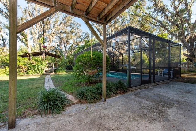 11008 Browning Rd, Lithia, FL 33547 - view of patio / terrace with an outdoor pool and glass enclosure