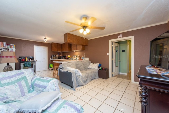 tiled living room featuring ceiling fan and ornamental molding