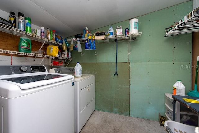 washroom featuring washer and dryer