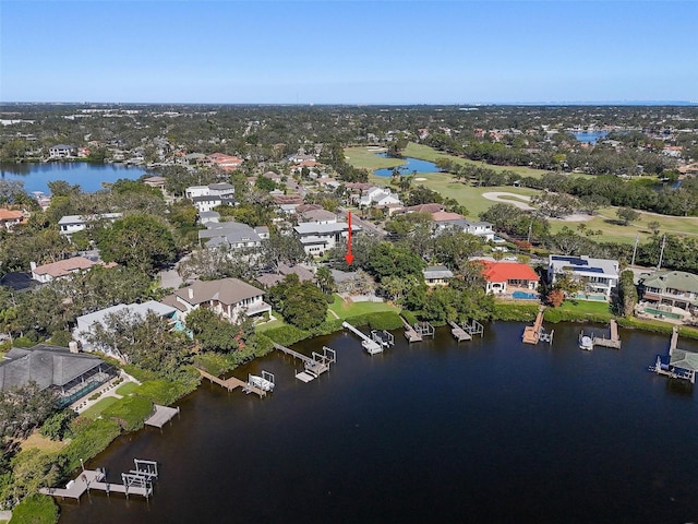 birds eye view of property featuring a water view