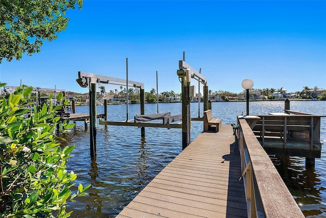 dock area featuring a water view