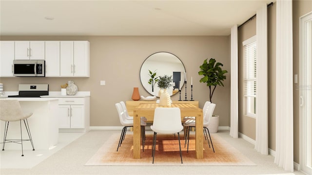 view of carpeted dining room