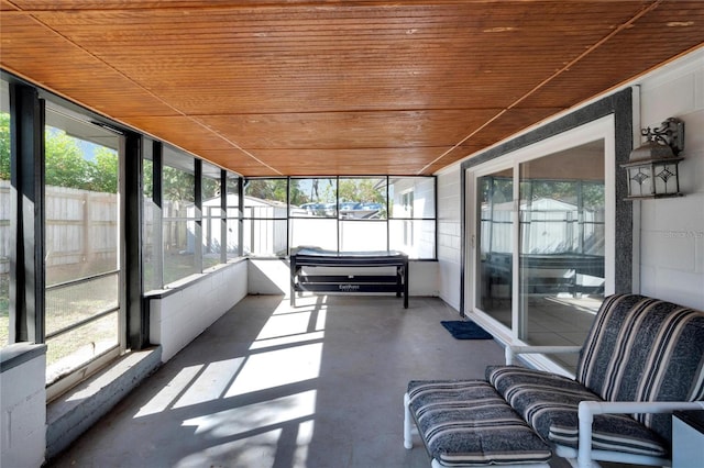 sunroom / solarium with wood ceiling