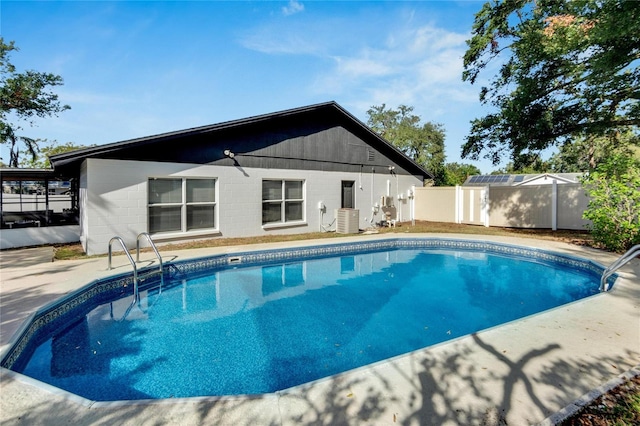 view of swimming pool with cooling unit