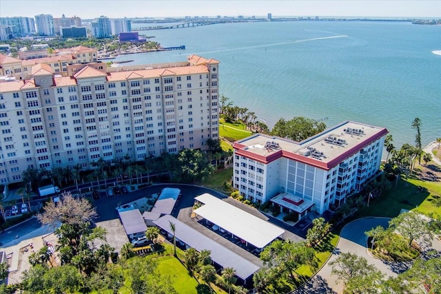 birds eye view of property with a water view