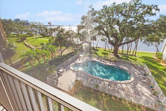 view of swimming pool with a water view