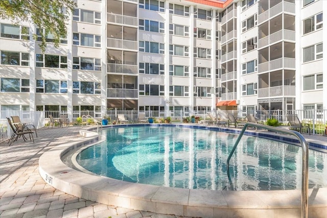 view of swimming pool featuring a patio