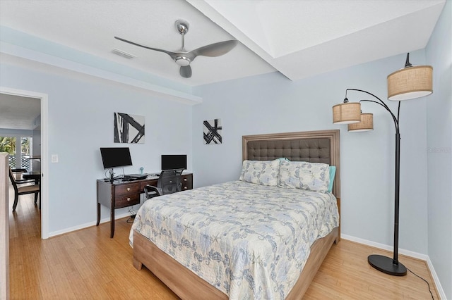 bedroom featuring ceiling fan and wood-type flooring