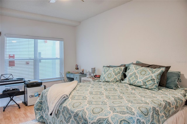 bedroom featuring light wood-style flooring