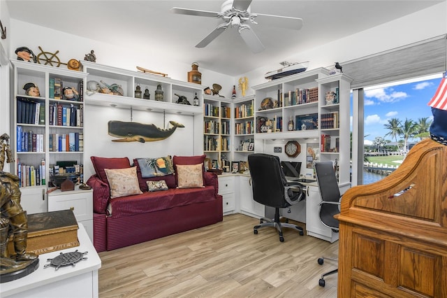 office space featuring light wood-type flooring and ceiling fan