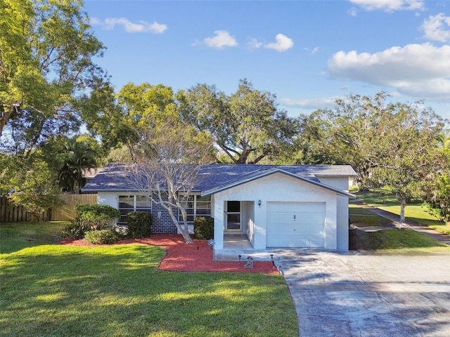 single story home with a garage and a front yard