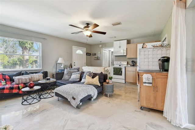 living room featuring ceiling fan