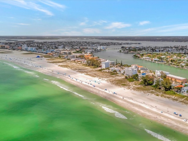 bird's eye view featuring a water view and a view of the beach