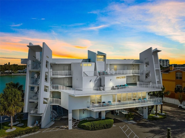 outdoor building at dusk with a water view