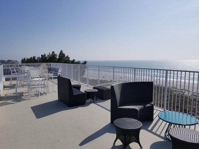 view of patio / terrace featuring a water view