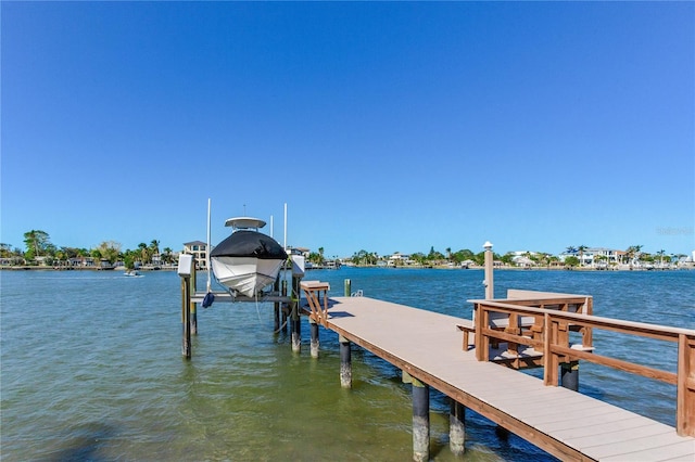 view of dock with a water view