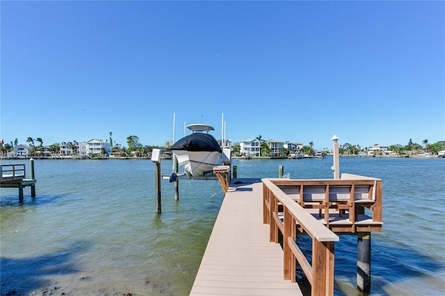 dock area with a water view