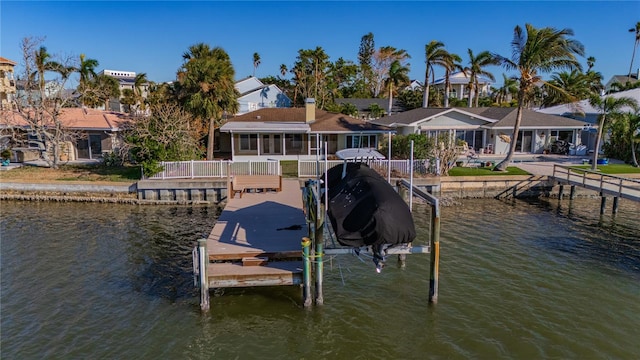 dock area with a water view