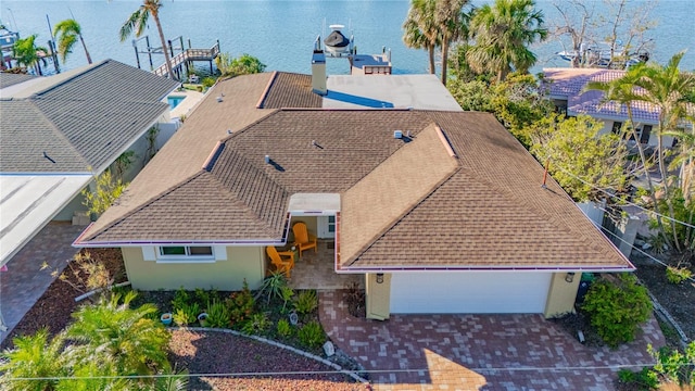 drone / aerial view with a water view