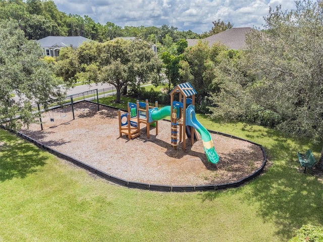 view of playground featuring a lawn