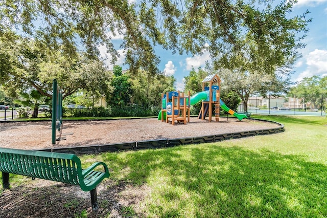 view of jungle gym with a lawn