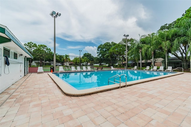 view of pool with a patio