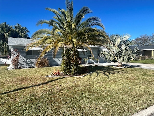 view of home's exterior with a lawn